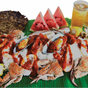 Boodle Set 1 (For 2 Persons)Tortang talong, crab, shrimp, mussels, fruits, squid, unli rice and iced tea.